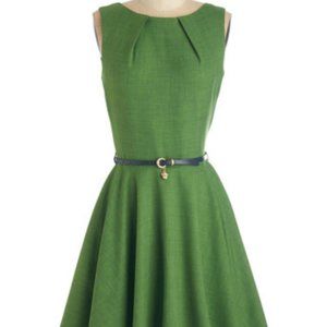 Green a-line midi dress with pockets! Back zip and navy blue belt. Size 18.